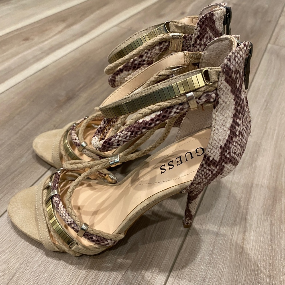 Beautiful burgundy snake skin design with gold accent sandals.